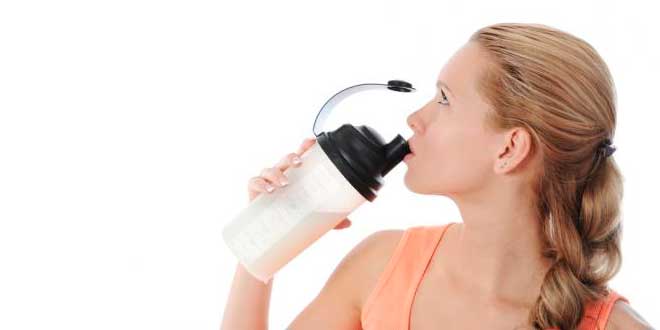 Woman drinking protein shake