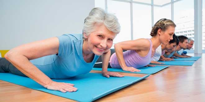 Old woman doing yoga