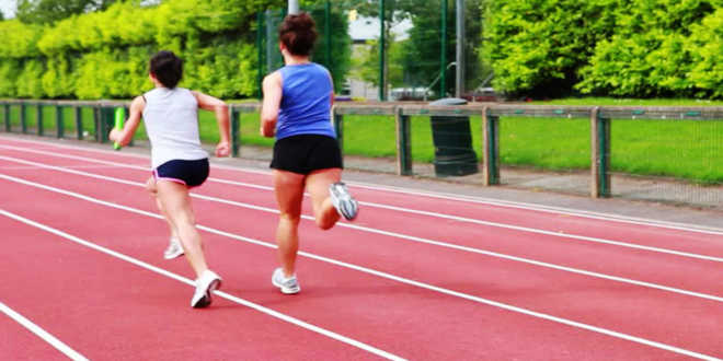 Two women running