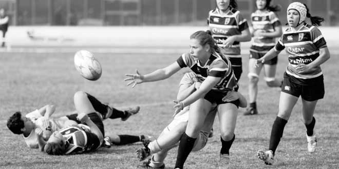 Women playing rugby Women playing rugby