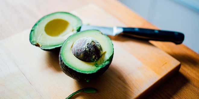 Avocado cut in a half Avocado cut in a half