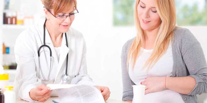 Woman consulting her doctor