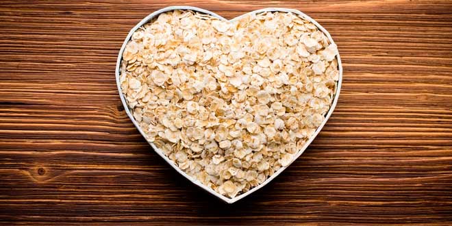 Heart-shaped bowl with oats Heart-shaped bowl with oats