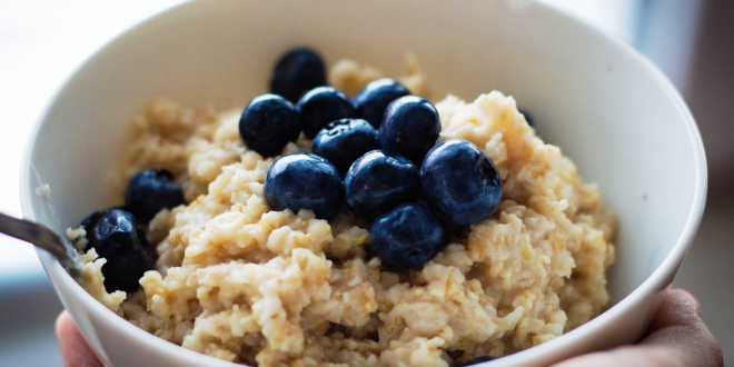 Bowl of oats and blueberries Bowl of oats and blueberries
