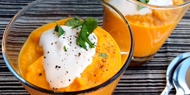 Served carrot soup