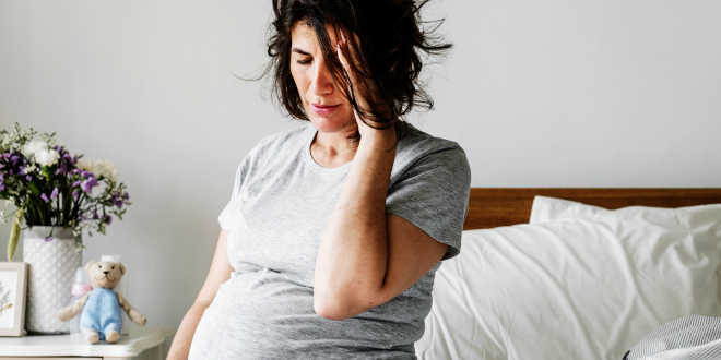 Pregnant woman looking tired Pregnant woman looking tired