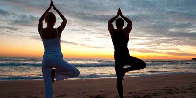 Couple doing yoga poses