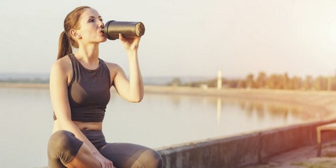 Woman drinking a protein shake