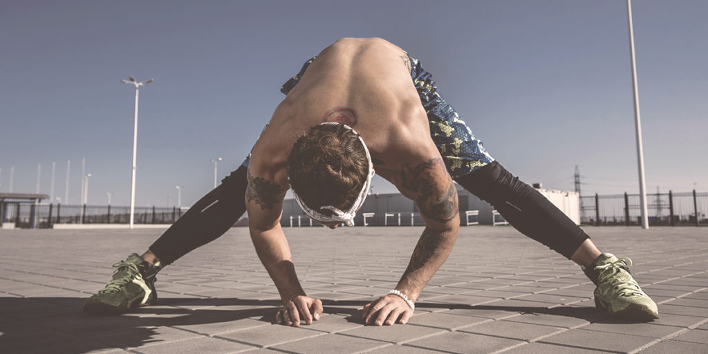 Man stretching workout