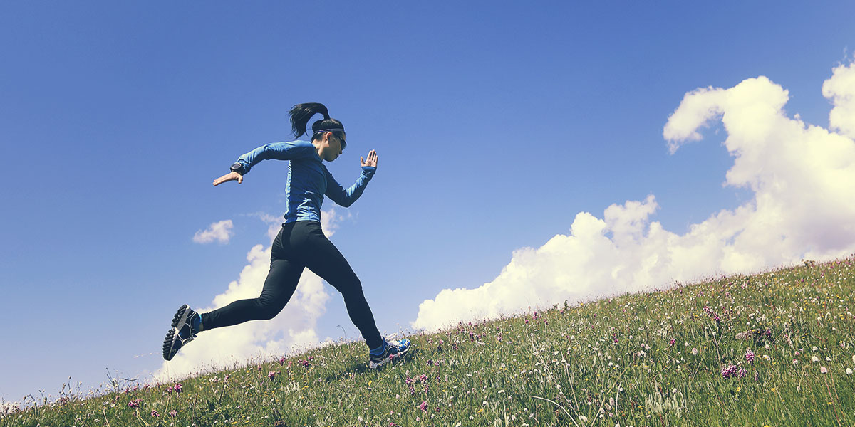 Woman running on a field