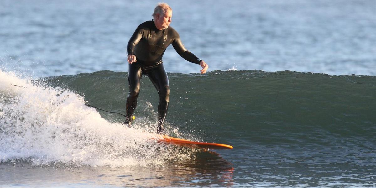 Old man surfing