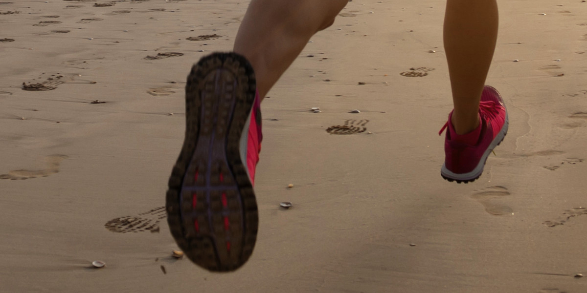 Running on the beach with or without trainers?