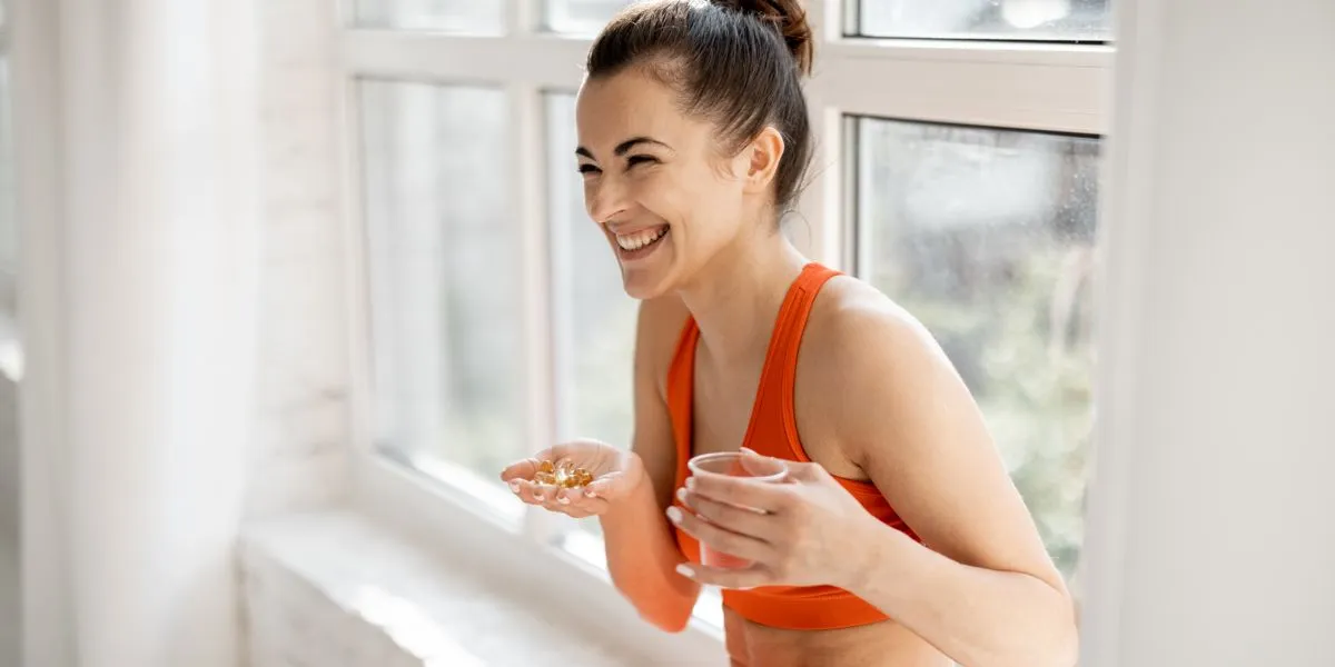 Sports girl taking supplements Sports girl taking supplements