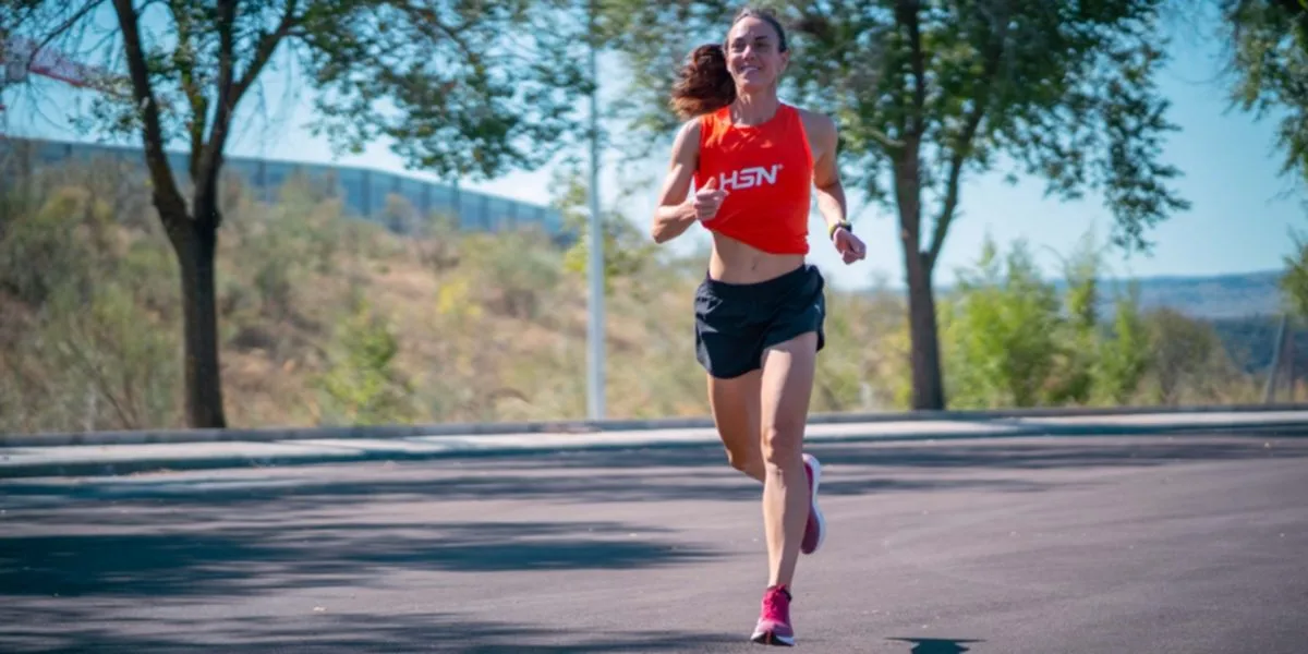 Female athlete running with focused mind