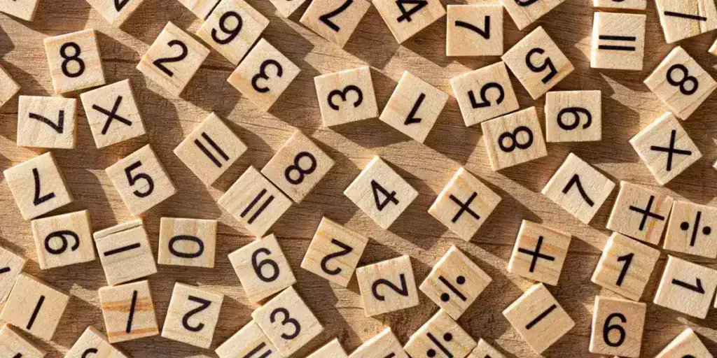 Numbers and mathematical signs in wood for calculations