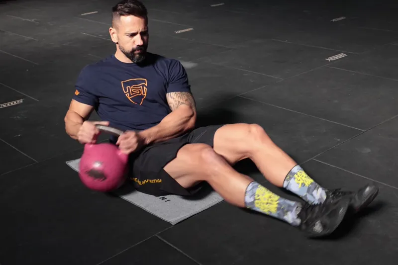 Russian twists with a kettlebell